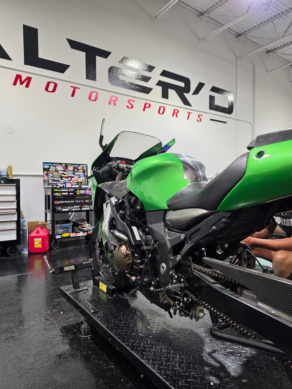 Sportbike on the lift in the bay
